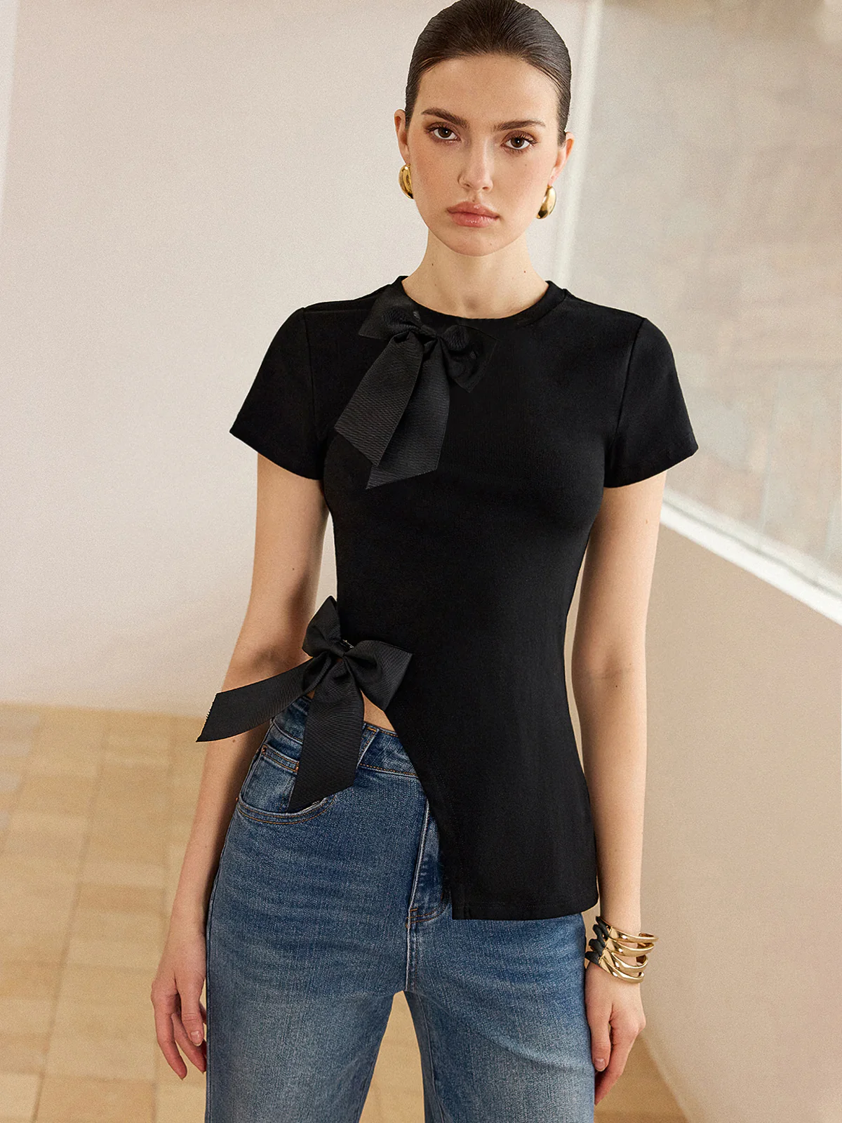 3D Bow-Detailed Top with Asymmetric Hem - Takermore